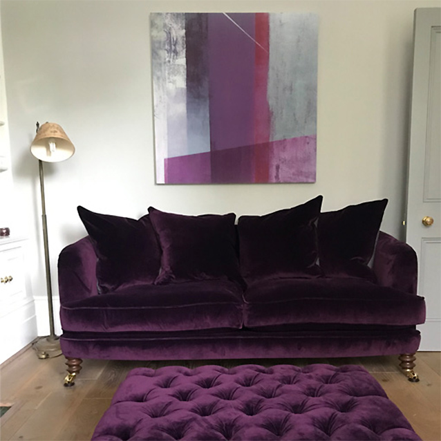 Helmsley 3 Seater Sofa and Pentlow Footstool is Omega Velvet Deep Purple